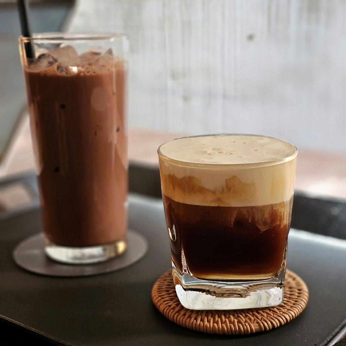 a couple of drinks sitting on top of a table
